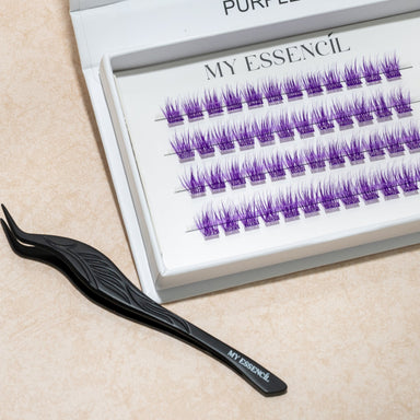 Boîte de faux cils violets Purple ouverte avec la pince applicatrice