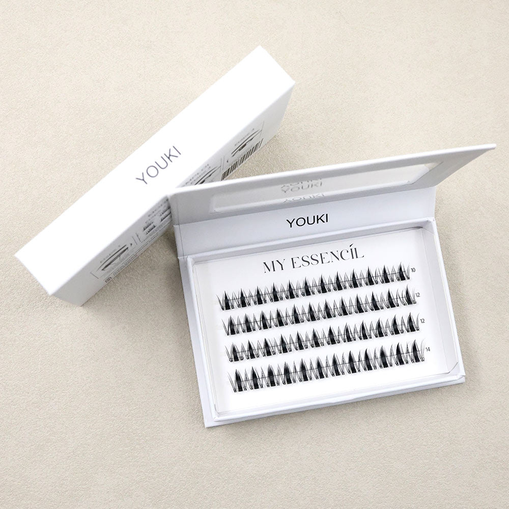 Coffret YOUKI ouvert et son étui sur fond gris clair