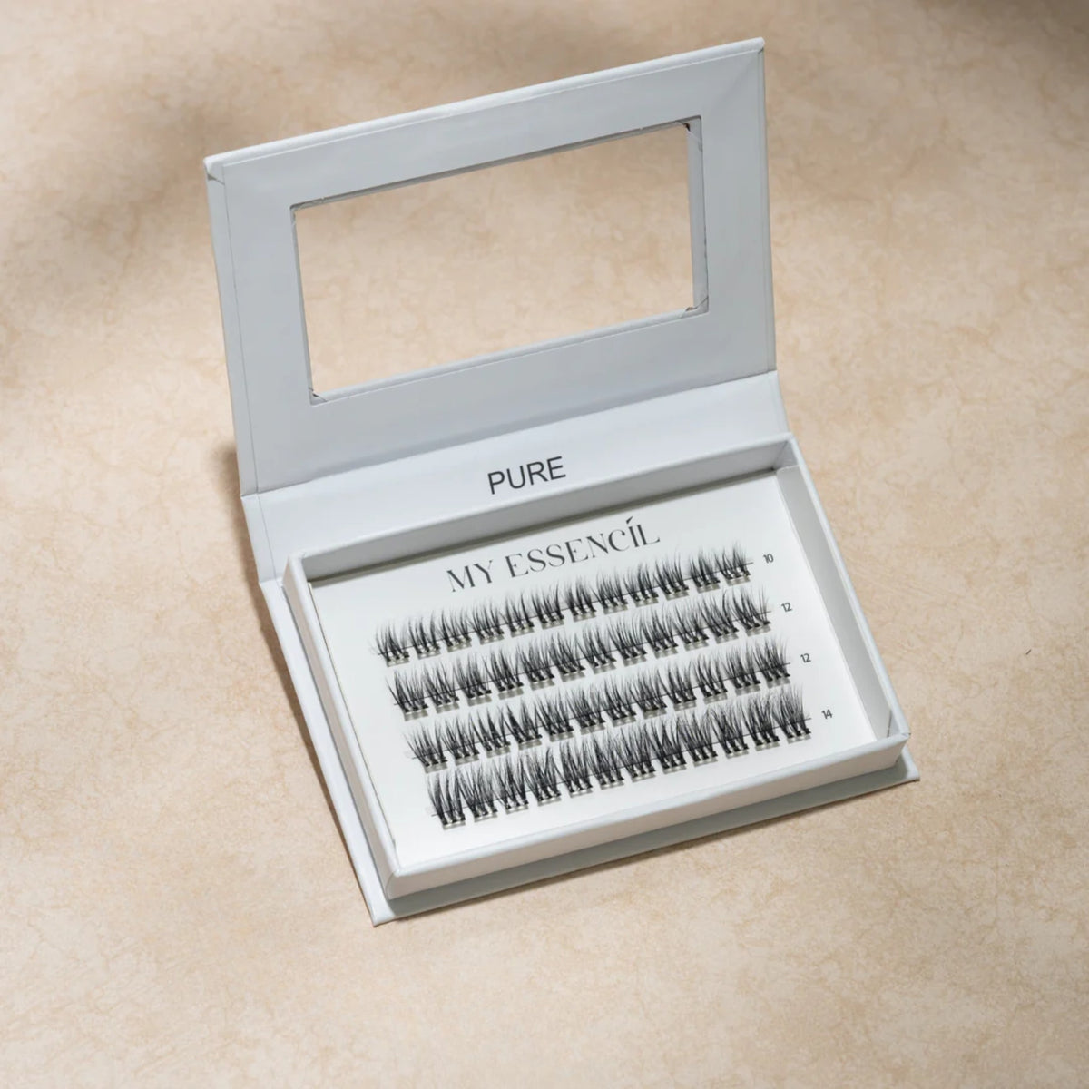 Coffret PURE MyEssencìl à fenêtre transparente sur fond beige